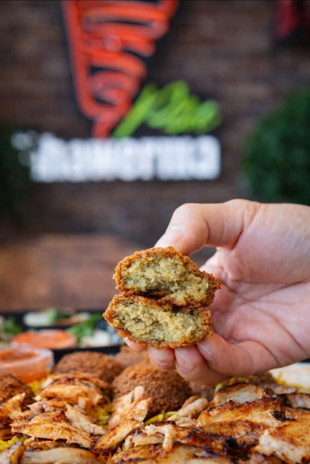 Fresh falafel opened to show its crisp texture